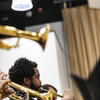 Photo of students playing trumpet in class